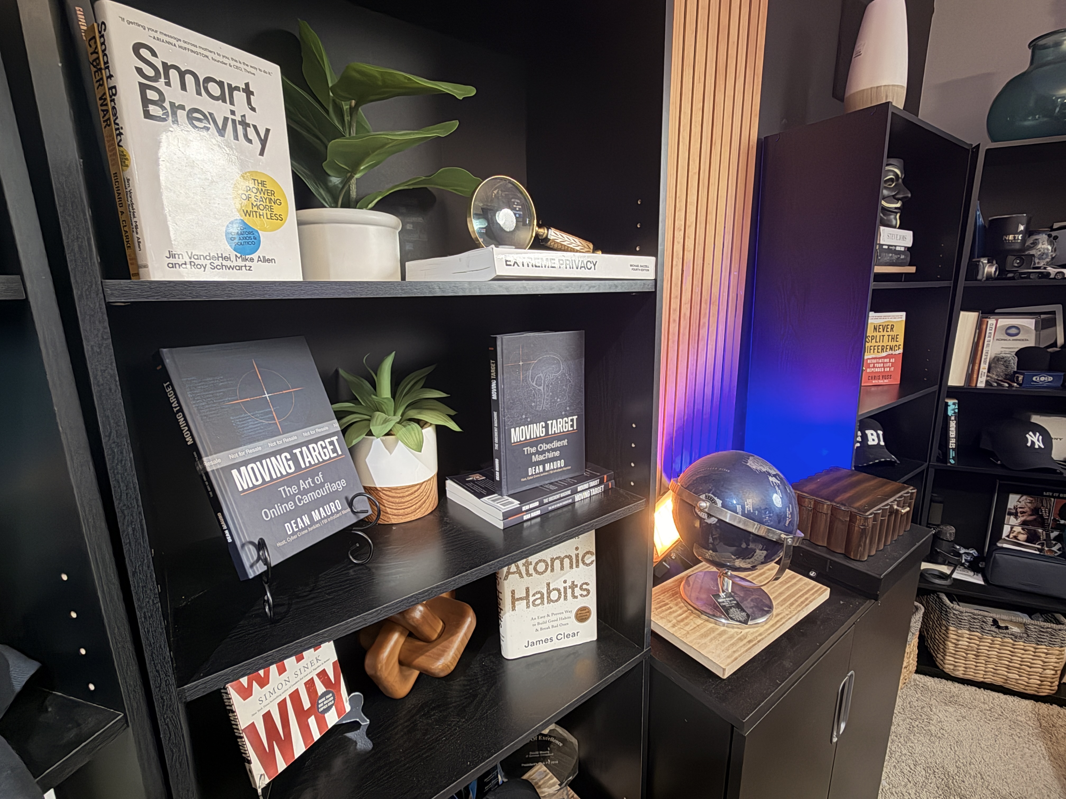 Moving Target books on studio shelf