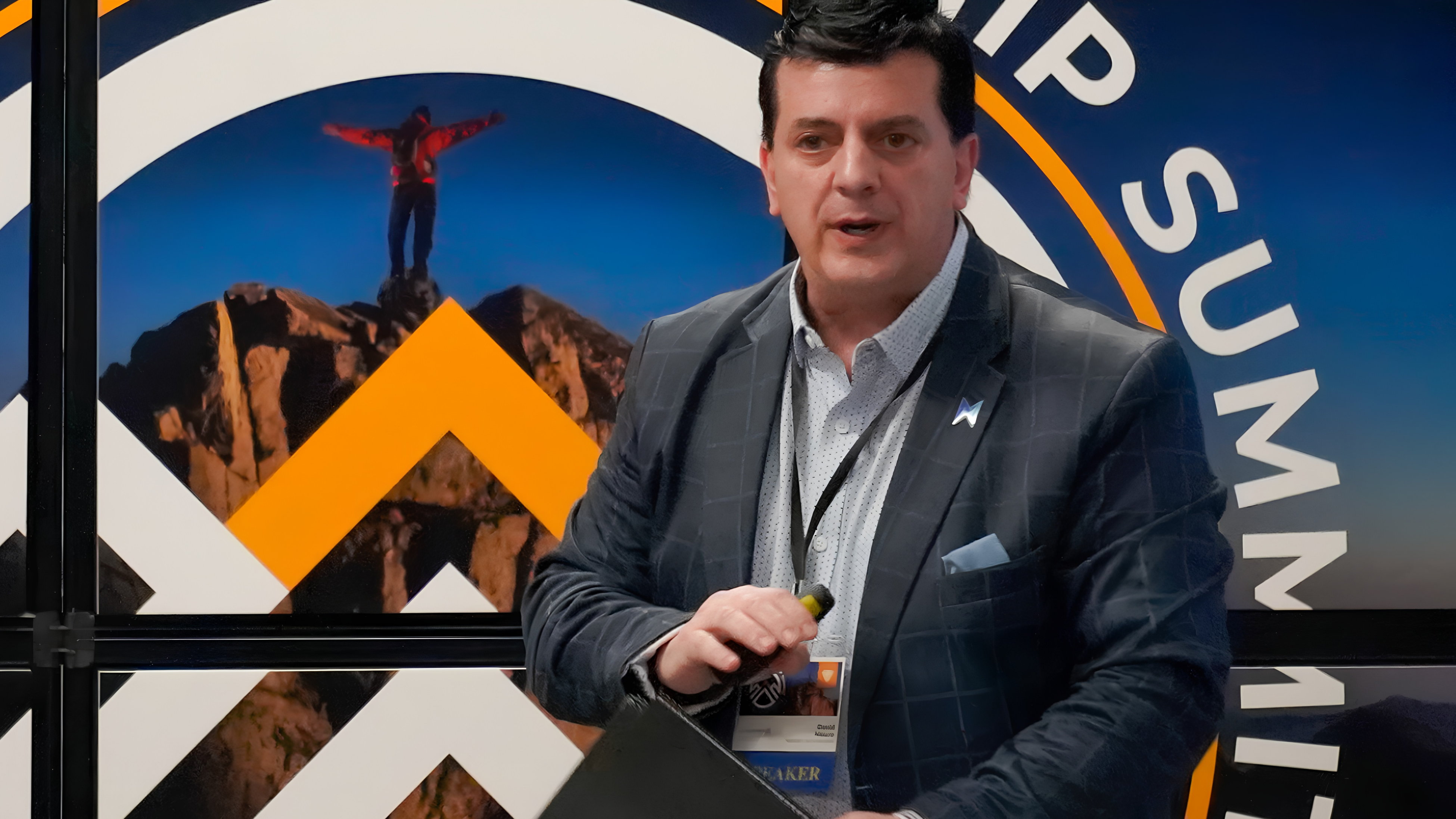 Dean Mauro speaking at a leadership summit